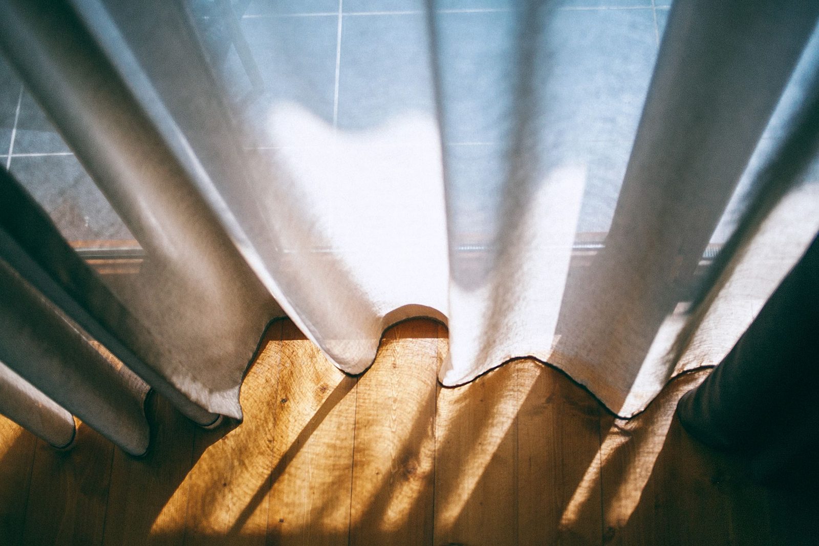 Sunlight falling across a clean, quiet room